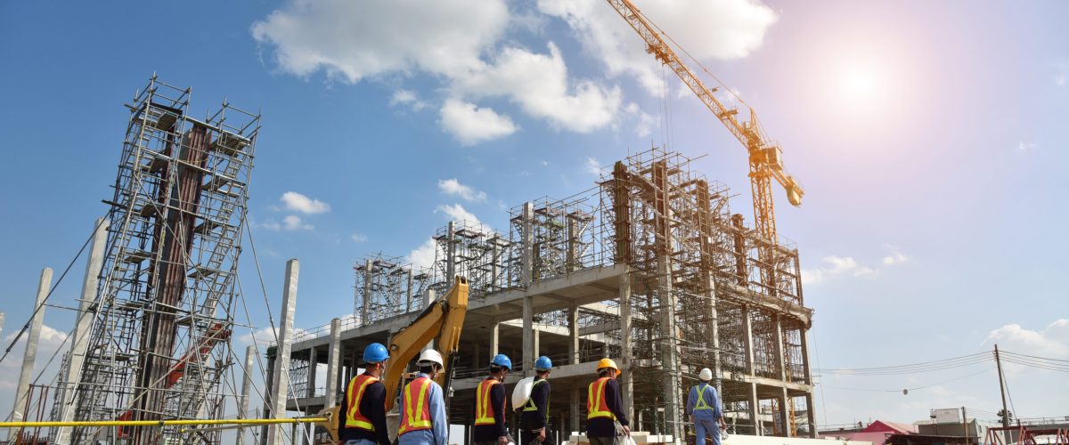 Construction Site with Cranes and construction worker